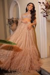 Shop_Isa By Dolly Wahal_Gold Net Embellished Bead Scoop Sequin Feather Bridal Lehenga Set _Online_at_Aza_Fashions