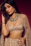 Isa By Dolly Wahal_Gold Net Embellished Bead Scoop Sequin Feather Bridal Lehenga Set _Online