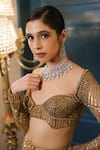 Shop_Isa By Dolly Wahal_Gold Net Embellished Bead Stella Checkered Fish-cut Bridal Lehenga With Blouse _Online_at_Aza_Fashions