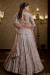 Shop_Isa By Dolly Wahal_Pink Net Embellished Bead Afra Floral Chevron Sequin Bridal Lehenga Set _at_Aza_Fashions