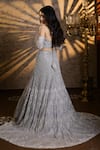 Shop_Isa By Dolly Wahal_Silver Net Embellished Bead Off Sienna Crystal Scallop Bridal Trail Lehenga Set _at_Aza_Fashions