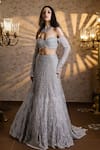 Shop_Isa By Dolly Wahal_Silver Net Embellished Bead Off Sienna Crystal Scallop Bridal Trail Lehenga Set _Online_at_Aza_Fashions