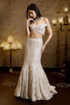 Buy_Isa By Dolly Wahal_Ivory Net Embellished Bead Off Rena Chevron Crystal Bridal Mermaid Lehenga Set _Online_at_Aza_Fashions