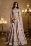 Buy_Isa By Dolly Wahal_Pink Net Embellished Pearl Zardozi Embroidered Floral Bridal Lehenga Set _at_Aza_Fashions