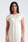 Shop_Deme by Gabriella_Off White Satin Solid Round Lea Cowl Back Neck Gown _at_Aza_Fashions