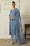 Buy_Peeli Dori_Blue Silk Chanderi Hand Embroidered Sequin V-neck Iris Floral Kurta Pant Set _at_Aza_Fashions