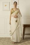 Buy_Peeli Dori_Ivory Silk Organza Hand Embroidered Sequin Paro Floral Saree With Blouse _at_Aza_Fashions