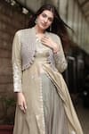 Nikita Vishakha_Beige Tissue Embroidered Mirror Kurta V Neck Flared Lehenga Set _at_Aza_Fashions