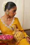 Moirra_Yellow Gota Patti Sunheri Embroidered Potli _Online_at_Aza_Fashions