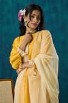 Mushio_Yellow Kurta Chanderi Embroidery Floral Round Amrai A-line And Pant Set _Online_at_Aza_Fashions