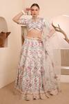 Buy_ISHRAM COUTURE_Ivory Handwoven Cotton Silk Embroidered Thread Akanksha Floral Lehenga Set _at_Aza_Fashions