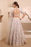 Shop_ISHRAM COUTURE_Ivory Handwoven Cotton Silk Embroidered Thread Akanksha Floral Lehenga Set _at_Aza_Fashions