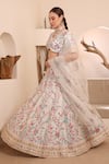 ISHRAM COUTURE_Ivory Handwoven Cotton Silk Embroidered Thread Akanksha Floral Lehenga Set _at_Aza_Fashions