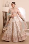 Buy_ISHRAM COUTURE_Ivory Handwoven Cotton Silk Embroidered Thread V-neck Moksh Floral Lehenga Set _Online_at_Aza_Fashions