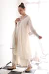 Shop_ISHRAM COUTURE_Ivory Handwoven Cotton Silk Embroidered Thread Nirav Floral Kurta Pant Set _at_Aza_Fashions