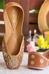 Buy_Amaryllis For Her_Brown Zari Iris Bloom Embroidered Juttis _at_Aza_Fashions