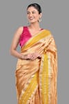 Zal From Benaras_Yellow Pure Tissue Silk Woven Zari Border Saree With Unstitched Blouse Piece _at_Aza_Fashions