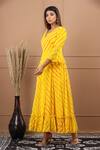 Shop_SUTI KAPDA_Yellow Chiffon V Neck Leheriya Pattern Flared Gown _Online_at_Aza_Fashions