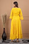 Shop_SUTI KAPDA_Yellow Chiffon V Neck Leheriya Pattern Flared Gown _at_Aza_Fashions