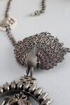 Shop_Mero Jewellery_Silver Plated Tribal Peacock Temple Long Pendant Necklace _at_Aza_Fashions