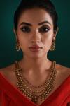 Shop_Zaza By Somya_Gold Plated Stone Divinity Adorned Studded Necklace Set _at_Aza_Fashions