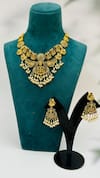 Shop_Zaza By Somya_Gold Plated Stone Goddess Laxmi Carved Pendant Necklace Set _at_Aza_Fashions