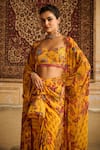 Shop_DiyaRajvvir_Yellow Crepe Printed Floral Scoop Embroidered Cape Draped Skirt Set _Online_at_Aza_Fashions