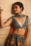 DiyaRajvvir_Blue Tulle Embroidered Mirror Plunging And Sequin Lehenga Set _at_Aza_Fashions