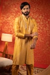 Buy_Kaaj Button_Yellow Chanderi Silk Embroidery Mirror Zigzag Work Kurta Set _Online_at_Aza_Fashions