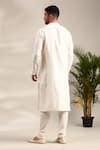 Shop_Mayank Modi - Men_Ivory Silk Floral Pattern Straight Kurta With Churidar _at_Aza_Fashions