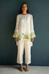 Shop_Oja_Ivory Linen Fletcher Hand Embroidery Floral Round Placement Long Top With Pant _at_Aza_Fashions