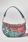 The Garnish Company_Blue Printed Thalia Floral Sequined Crecent Bag _at_Aza_Fashions