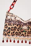 The Garnish Company_Brown Printed Cheetah Tasselled Bag _Online_at_Aza_Fashions