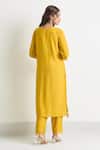 Shop_Naintara Bajaj_Yellow Chanderi, Crepe, Silk Tassels, Embroidery Keyhole Floral Yoke Kurta Set _at_Aza_Fashions