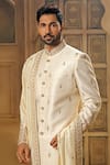 Buy_Vanshik_White Raw Silk Embroidery Butti Sherwani Pant Set _Online_at_Aza_Fashions