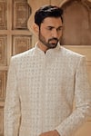 Vanshik_Off White Raw Silk Embroidered Resham Botanic Sherwani Pant Set _Online_at_Aza_Fashions