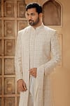 Buy_Vanshik_Off White Raw Silk Embroidered Resham Botanic Sherwani Pant Set _Online_at_Aza_Fashions