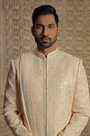 Vanshik_Beige Silk Embroidered Jamewar Floral Sherwani Pyjama Set _Online_at_Aza_Fashions