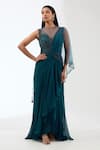 Buy_Anjali Kanwar_Green Silk Embroidery Sequin Illusion Sheer Round Neck Stripe Draped Saree Gown _at_Aza_Fashions