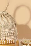 Buy_Amyra_Off White Pearls, Cut Work Anahi Dangler Potli Bag _Online_at_Aza_Fashions