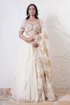 Buy_Shwetanga_Ivory Organza Foil Printed Sequin Sweetheart Ruffle Layered Lehenga Set _at_Aza_Fashions