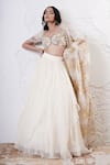 Shop_Shwetanga_Ivory Organza Foil Printed Sequin Sweetheart Ruffle Layered Lehenga Set 