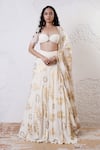 Buy_Shwetanga_Ivory Organza Foil Printed Bead Sweetheart Leaf Embroidered Lehenga Set _at_Aza_Fashions