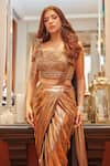 RAJ ARORA_Gold Leather Lycra Embroidered Cutdana Metallic Pre-draped Saree With Blouse _Online_at_Aza_Fashions