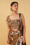 RAJ ARORA_Gold Leather Lycra Embroidered Cutdana Metallic Pre-draped Saree With Blouse _at_Aza_Fashions