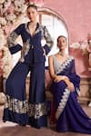 Krisha sunny Ramani_Blue Georgette Embroidered Sequin V-neck Pre-draped Saree With Blouse _at_Aza_Fashions