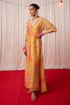 Chrkha_Yellow Chanderi Silk Print Tassel V-neck Paisley Mirror Embroidered Kaftan _Online_at_Aza_Fashions