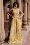 Buy_Paulmi and Harsh_Yellow Crepe Printed Roop Bird Flip Round Jumpsuit With Belt _at_Aza_Fashions