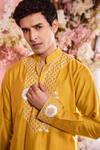 Krisha sunny Ramani_Yellow Cotton Silk Embroidered Beads Resham Kurta With Pant _Online_at_Aza_Fashions