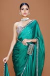 Neeta Lulla_Emerald Green Satin Embroidery Sequin Sweetheart Ira Border Saree With Bustier _Online_at_Aza_Fashions